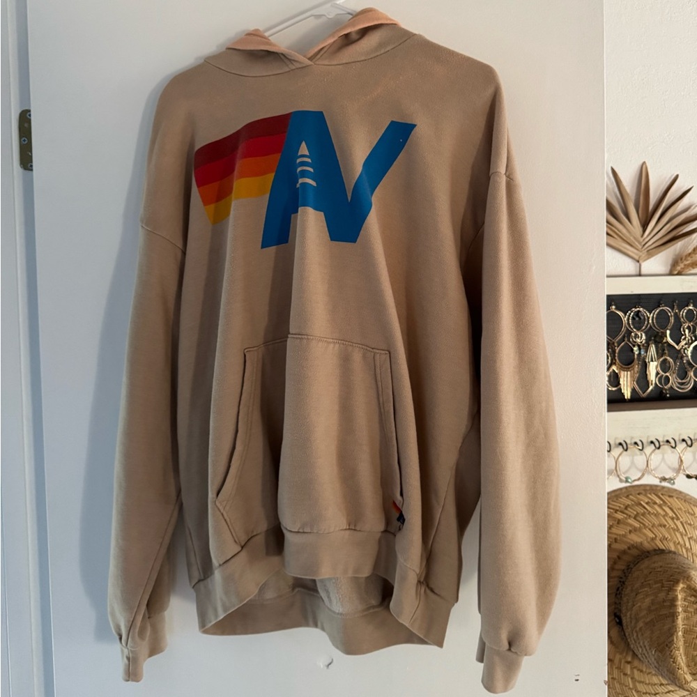 Aviator nation hoodie. Size medium. Tan color. Some bleach stains